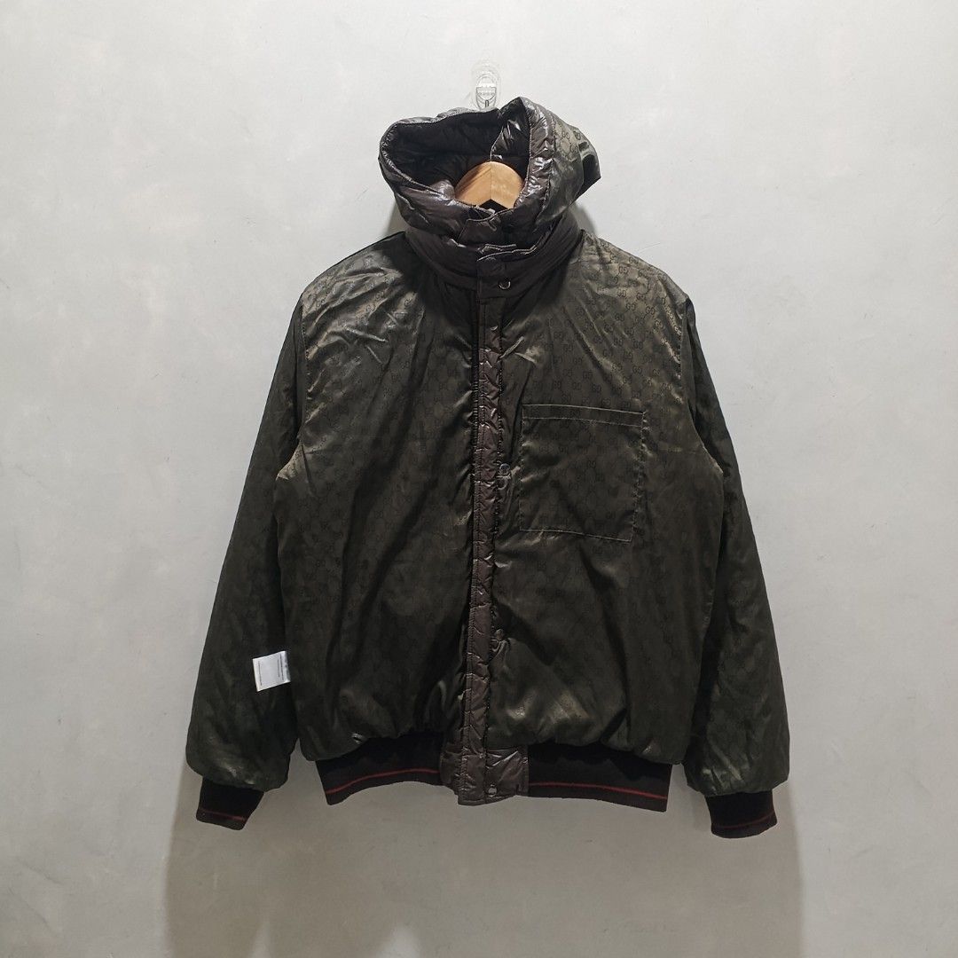 Gucci Reversible Puffer Jacket Hooded Down Brown Size L (Category: Coats, Jackets and Outerwear) located in Malasiqui. Submitted by drie_findss (Listing ID 1447685415, Image 3). Description: Gucci puffer jacket reversible monogram (50/50) ‎_______________________ ‎Size: L on tag ‎(Measured by Inches) ‎Width: 22 ‎Length: 26 ‎Shoulder: 17 ‎Sleeve: 27 ‎Condition: GOOD ‎Color Rate: 10/10 ‎Issue: ONE BUTTON MISSING ‎_______________________ ‎ ‎Color ma