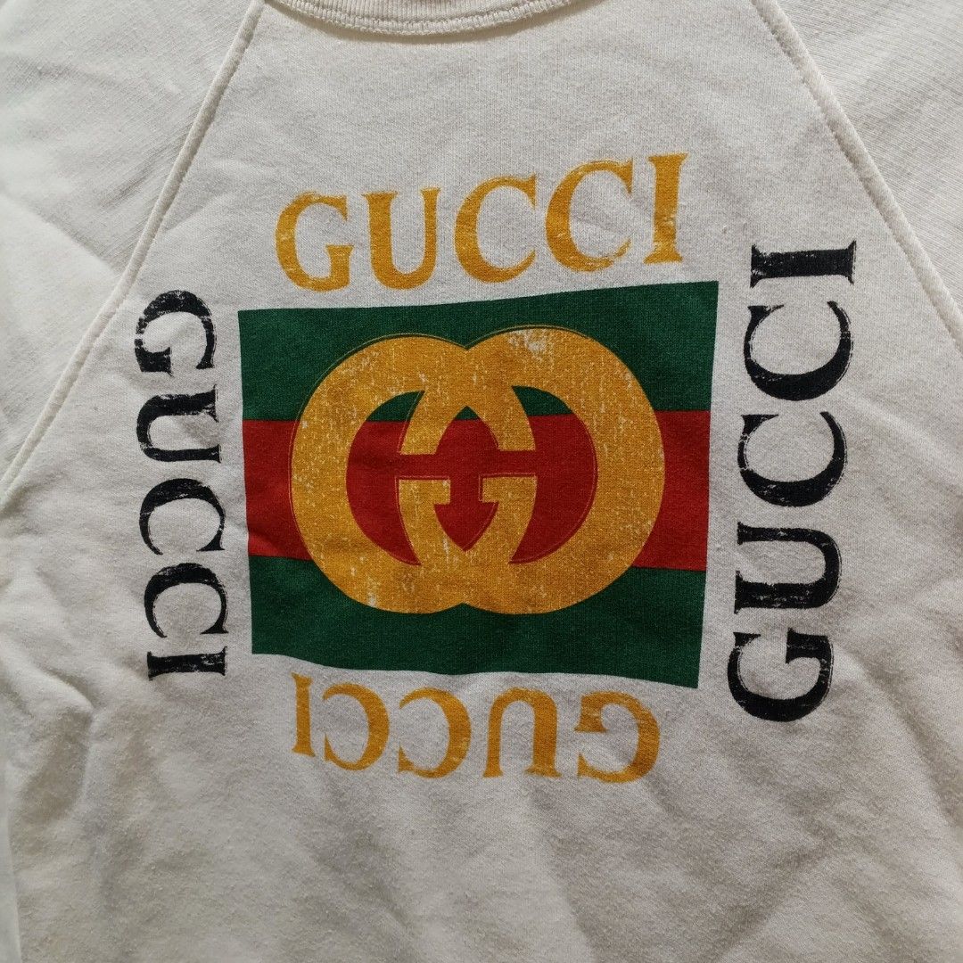 Gucci White Sweatshirt with Logo (Category: Luxury Apparel) located in Malasiqui. Submitted by drie_findss (Listing ID 1447685410, Image 3). Description: Gucci Boys Retro Logo (Authentic) ‎_______________________ ‎Size: 10 on tag ‎(Measured by Inches) ‎Width: 15 ‎Length: 21.5 ‎Shoulder: 13 ‎Sleeve: 22 ‎Condition: EXCELLENT ‎Color Rate: 10/10 ‎Issue: None ‎_______________________ ‎ ‎Color may vary due to lightning so check wisely. ‎Thank you for y