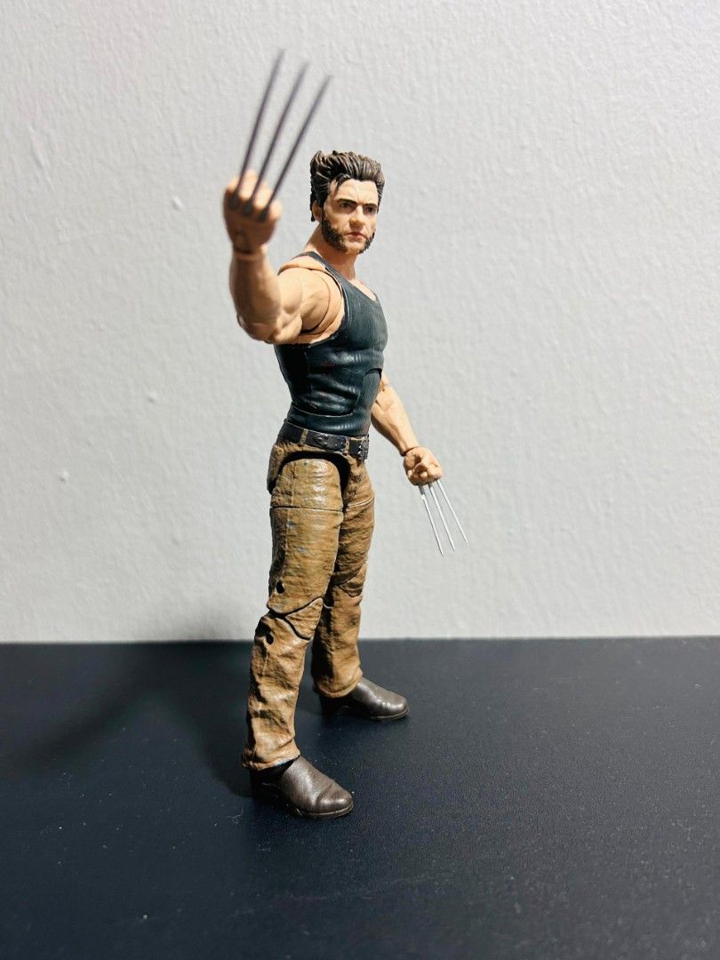 Hasbro Marvel Legends Wolverine Action Figure (Category: Toys & Games) located in Sabak Bernam. Submitted by blitzkreck (Listing ID 1447695585, Image 1). Description: - Wolverine action figure - Features iconic adamantium claws - Dressed in a black tank top and brown pants - No box - Ideal for Marvel collectors - Ready for display and posing in action scenes.