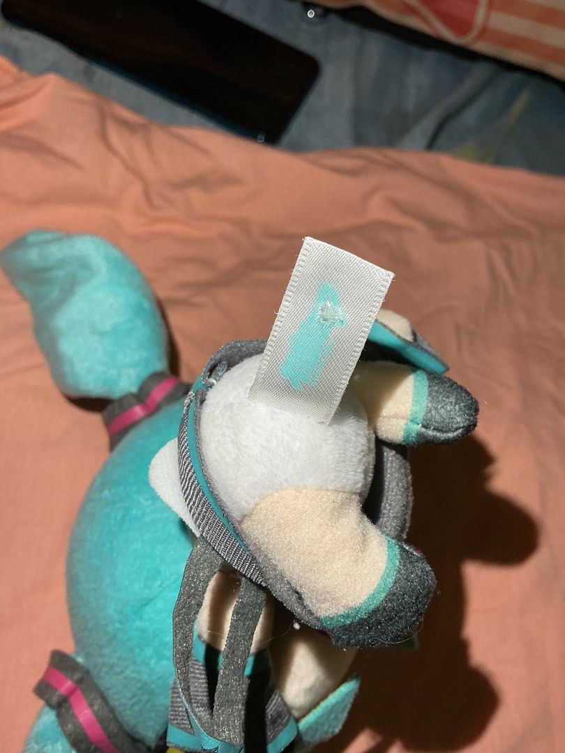 Hatsune Miku Plush Toy (Category: Plushies & Soft Toys) located in Marikina City. Submitted by raikee (Listing ID 1447806604, Image 3). Description: - Cute Hatsune Miku plush toy - Brand new with tag still attached - Approximately 6-7 inches - A must-have for any Hatsune Miku fan! -Ma maliit n butas yung etiketa. (See photo) Mop:Gcash or Maya Mod: Jnt or Lalamove (sf/df shouldered by buyer).