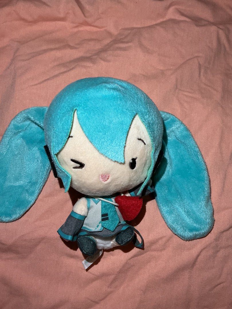 Hatsune Miku Plush Toy (Category: Plushies & Soft Toys) located in Marikina City. Submitted by raikee (Listing ID 1447806604, Image 1). Description: - Cute Hatsune Miku plush toy - Brand new with tag still attached - Approximately 6-7 inches - A must-have for any Hatsune Miku fan! -Ma maliit n butas yung etiketa. (See photo) Mop:Gcash or Maya Mod: Jnt or Lalamove (sf/df shouldered by buyer).