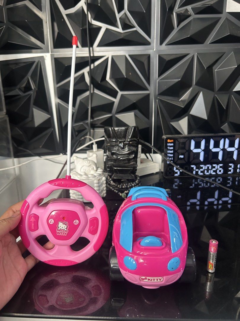 Hello Kitty RC Car Steering Wheel Controller (Category: Remote Control Toys) located in General Trias. Submitted by aprilocampo0412 (Listing ID 1447765660, Image 1). Description: Hello Kitty RC Car Steering Wheel Controller Working with sounds Issue missing HK figure na nakasakay,see video 250 Loc Tanza Cavite.