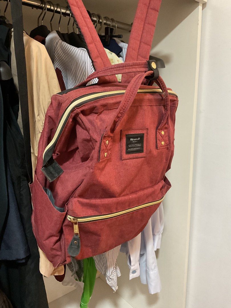 Himawari Red Backpack (Category: Backpacks) located in Bulacan. Submitted by periwinkle_21 (Listing ID 1447867452, Image 2). Description: CLEARANCE SALE MGA SISSY❤️ for declutter purposes langz - Classic red Himawari backpack - Spacious interior for ample storage as in spacious! - Convenient side pockets for water bottles or essentials - Secure zipper closure - Durable material built to last - Ideal for school, work, or everyday use - Has a charg
