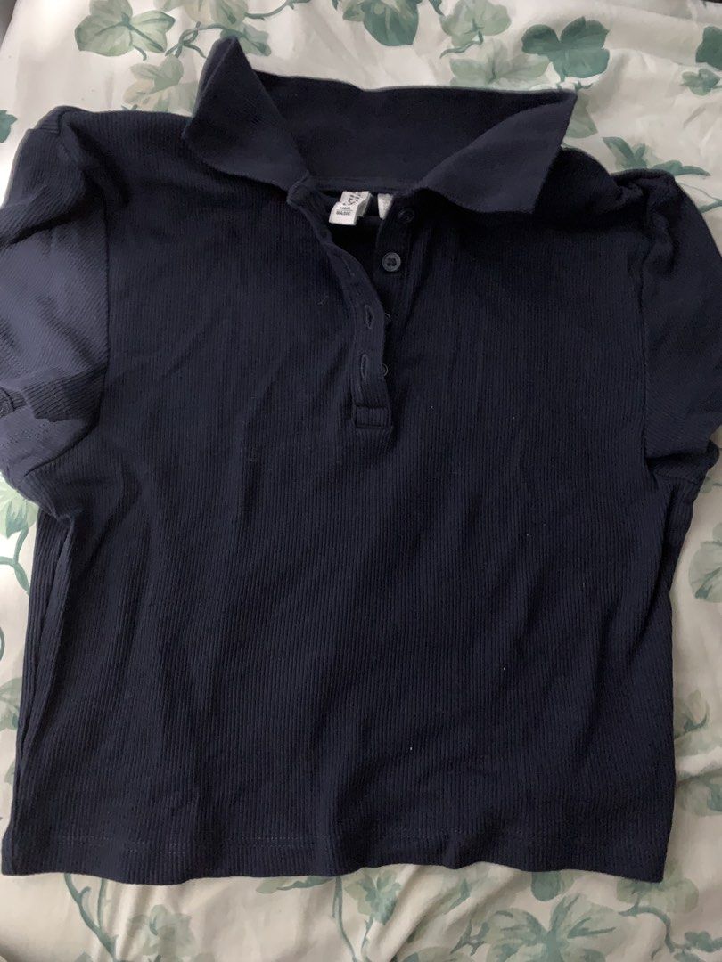 H&M Navy Blue Polo Crop Top Medium (Category: Shirts) located in Quezon City. Submitted by aliyahsam (Listing ID 1447843742, Image 2). Description: - Navy blue polo crop top - orig H&M -size medium rfs: sikip na QC loc lalamove/gogo express gcash/bdo available until july 21 only.