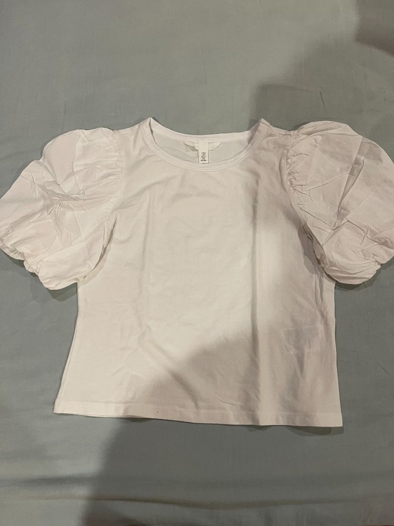 H&M White Puff Sleeve Shirt (Category: Shirts) located in Paranaque City. Submitted by declutteringtherapy (Listing ID 1447862417, Image 1). Description: - this was not used! - fitted style 💸 payment through gcash or bank transfer 🚚 delivery through lalamove/grab or j&t.