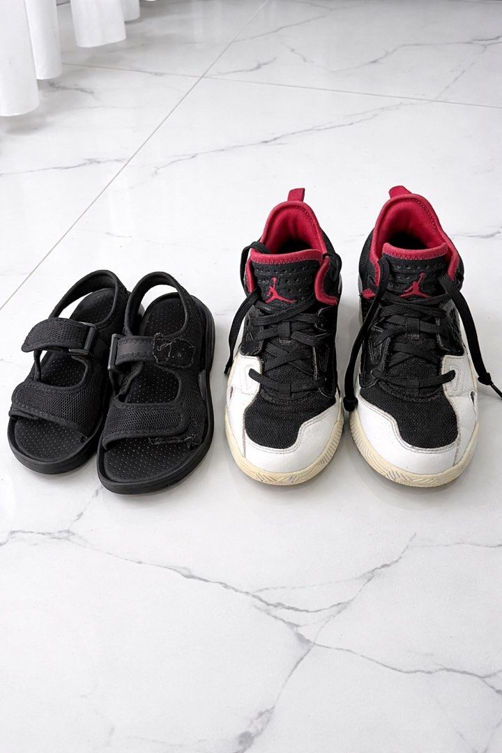Jordan Sneakers and Black Sandals (Category: Babies & Kids Fashion) located in Manila. Submitted by teontags (Listing ID 1447683671, Image 1). Description: - Kids' black sandals with easy velcro straps. - Kids' Jordan sneakers in black, white, and red. - Both items are in good, pre-loved condition. - Perfect for your little ones! - Feel free to ask any questions..