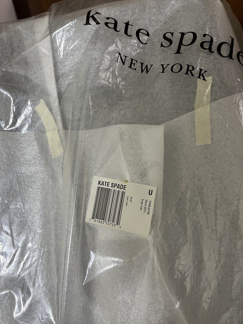 Kate Spade New York Black Leather Tote Bag (Category: Tote Bags) located in Petaling Jaya. Submitted by sookkuann (Listing ID 1447789007, Image 3). Description: - Authentic Kate Spade New York tote bag - Classic black color - Genuine leather material - Includes matching circular tag - Handles still have protective plastic wrap - Original tags attached - Ideal for everyday use or professional settings - measurements 27cmx 27cmx10cm.