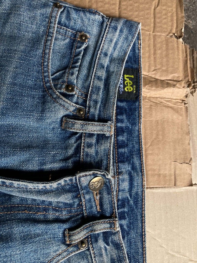Lee Jeans - Blue Denim - Distressed Style (Category: Jeans) located in Naga. Submitted by grunchieeeerr (Listing ID 1447834328, Image 3). Description: 29x40x8hem - Classic blue denim jeans from Lee - Distressed look with unique stitching details on the legs - Two back pockets with button closures - Comfortable fit for everyday wear - A great addition to your wardrobe.