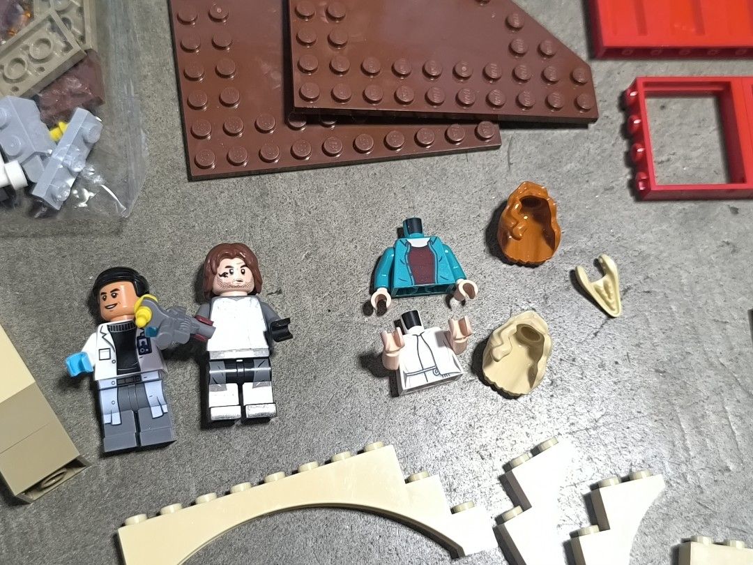 Lego Jurassic Park Incomplete (Category: Lego & Building Sets) located in Bacoor. Submitted by patrickpy063765 (Listing ID 1447788655, Image 2). Description: - Assorted LEGO pieces and minifigures - Includes Jurassic Park Minifigures 4 pieces characters - Variety of building bricks in brown, tan, grey, and red - Comes with base plates and accessories - Ideal for creative building and imaginative play - All items shown in the provided photos.