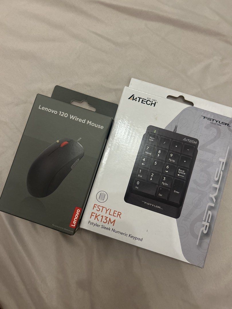 Lenovo Mouse + Numpad (Category: Mouse & Mousepads) located in Paranaque City. Submitted by nmalemania (Listing ID 1447837552, Image 1). Description: Lenovo Mouse - ₱699 in store Numpad - ₱350 in store Unused brandnew mouse, inopen lang yung box w/ free numpad.