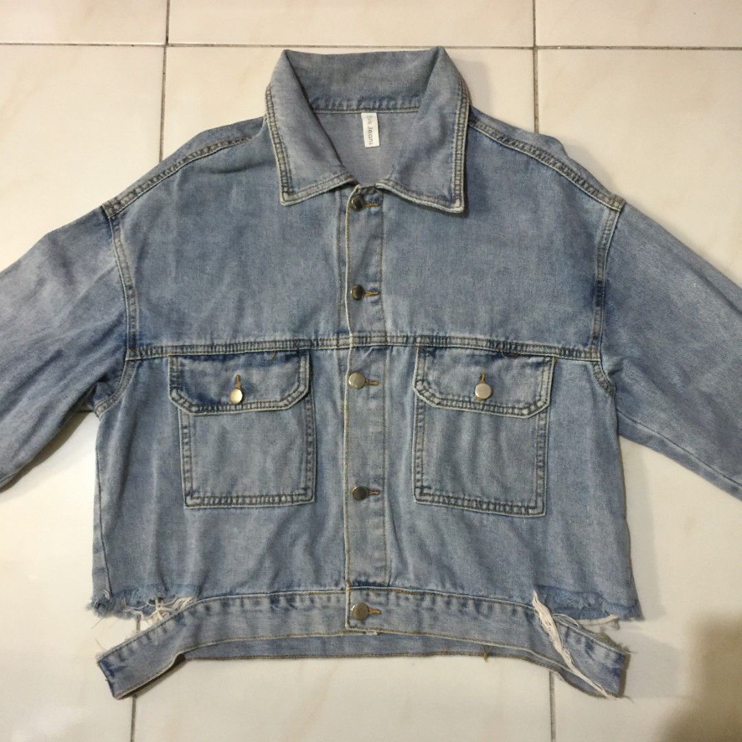Light-wash Blue Denim Jacket / Distressed Denim Jacket (Category: Coats, Jackets and Outerwear) located in Pasig City. Submitted by butfirst.declutter (Listing ID 1447839036, Image 2). Description: - No issue, well used - Thrifted - Non stretch. Distressed at the lower hem - Fits up to semi-XL - Color may vary due to lighting - See photos for measurements - Manage your expectations since this is a preloved item. You can message me for inquiries. 