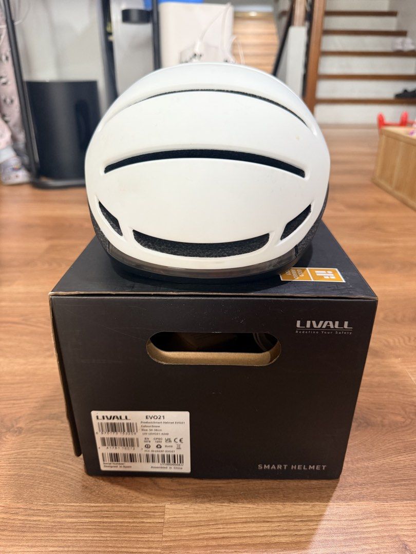 LIVALL EVO21 Smart Helmet with Bling Remote (Category: Helmets and other Riding Gears) located in San Juan City. Submitted by jerliu (Listing ID 1447727484, Image 2). Description: - LIVALL EVO21 Smart Helmet (Medium) - Color: White with black and red accents - Includes: Bling Remote BR80, bag, manuals and box - Benefit: Greatly enhances cycling safety Rarely used. Less than 5x https://livall.com/products/evo21.