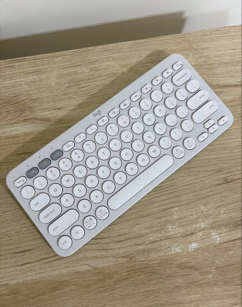 Logitech K380 Multi-Device Bluetooth Keyboard - Light Grey (Category: Computer Keyboard) located in Brookes Point. Submitted by tntkicks (Listing ID 1447788995, Image 1). Description: - Logitech K380 Bluetooth Keyboard - Compact and portable design - Connects to multiple devices simultaneously - Compatible with various operating systems (Windows, macOS, Android, iOS, etc.) - Easy device switching with a single button press - Comfortable typing ex