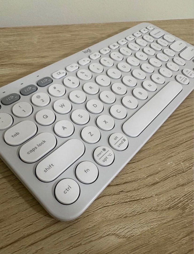 Logitech K380 Multi-Device Bluetooth Keyboard - Light Grey (Category: Computer Keyboard) located in Brookes Point. Submitted by tntkicks (Listing ID 1447788995, Image 2). Description: - Logitech K380 Bluetooth Keyboard - Compact and portable design - Connects to multiple devices simultaneously - Compatible with various operating systems (Windows, macOS, Android, iOS, etc.) - Easy device switching with a single button press - Comfortable typing ex