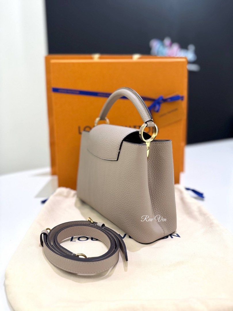 LOUIS VUITTON LV Capucines BB Bag In Galet Colour With Gold - Tone (Category: Bags & Wallets) located in Kuala Lumpur. Submitted by stylishtalk (Listing ID 1447742832, Image 3). Description: [ Product Information ] ⚐ Item : LOUIS VUITTON LV Capucines BB Bag In Galet Colour With Gold - Tone ⚐ Brand :LOUIS VUITTON ⚐ Type : Shoulder Bage ⚐ Condition : 9/10 ⚐ Size / Measurement : L 27 cm / H 17 cm / W 9 cm ⚐ Include :NFC / Box / Dustbag / ⚐ Authentic