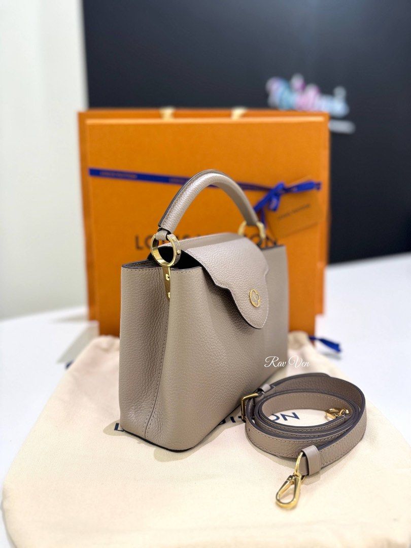 LOUIS VUITTON LV Capucines BB Bag In Galet Colour With Gold - Tone (Category: Bags & Wallets) located in Kuala Lumpur. Submitted by stylishtalk (Listing ID 1447742832, Image 2). Description: [ Product Information ] ⚐ Item : LOUIS VUITTON LV Capucines BB Bag In Galet Colour With Gold - Tone ⚐ Brand :LOUIS VUITTON ⚐ Type : Shoulder Bage ⚐ Condition : 9/10 ⚐ Size / Measurement : L 27 cm / H 17 cm / W 9 cm ⚐ Include :NFC / Box / Dustbag / ⚐ Authentic