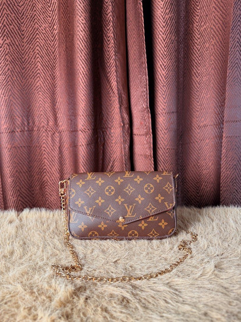 Louis Vuitton Monogram Canvas Crossbody Bag (Category: Luxury Bags & Wallets) located in Manila. Submitted by femnlofficial (Listing ID 1447881273, Image 1). Description: - Classic Louis Vuitton monogram canvas crossbody bag - Features a stylish gold chain strap - Secure envelope flap closure with elegant gold hardware - Versatile: ideal for everyday use or a night out - Spacious enough to carry all your essentials - A truly timeless and iconic f