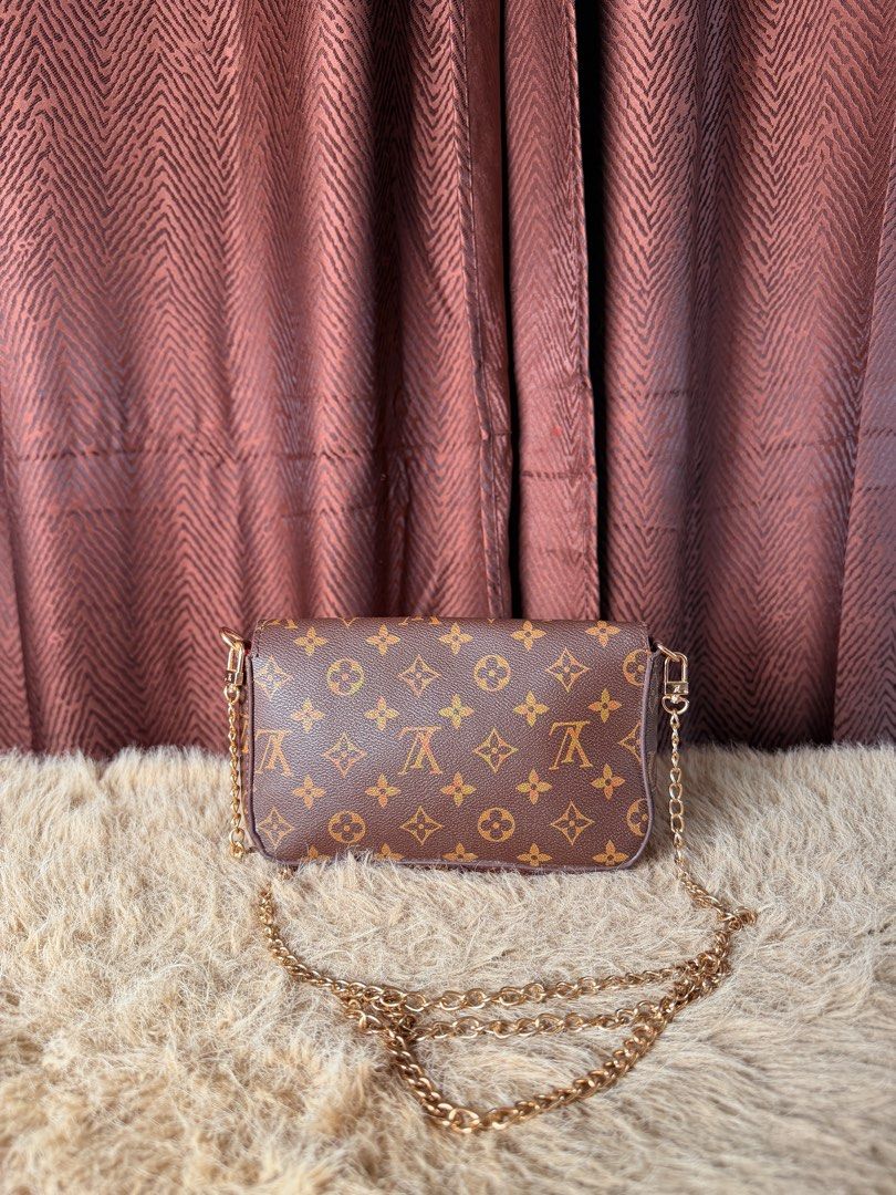 Louis Vuitton Monogram Canvas Crossbody Bag (Category: Luxury Bags & Wallets) located in Manila. Submitted by femnlofficial (Listing ID 1447881273, Image 2). Description: - Classic Louis Vuitton monogram canvas crossbody bag - Features a stylish gold chain strap - Secure envelope flap closure with elegant gold hardware - Versatile: ideal for everyday use or a night out - Spacious enough to carry all your essentials - A truly timeless and iconic f