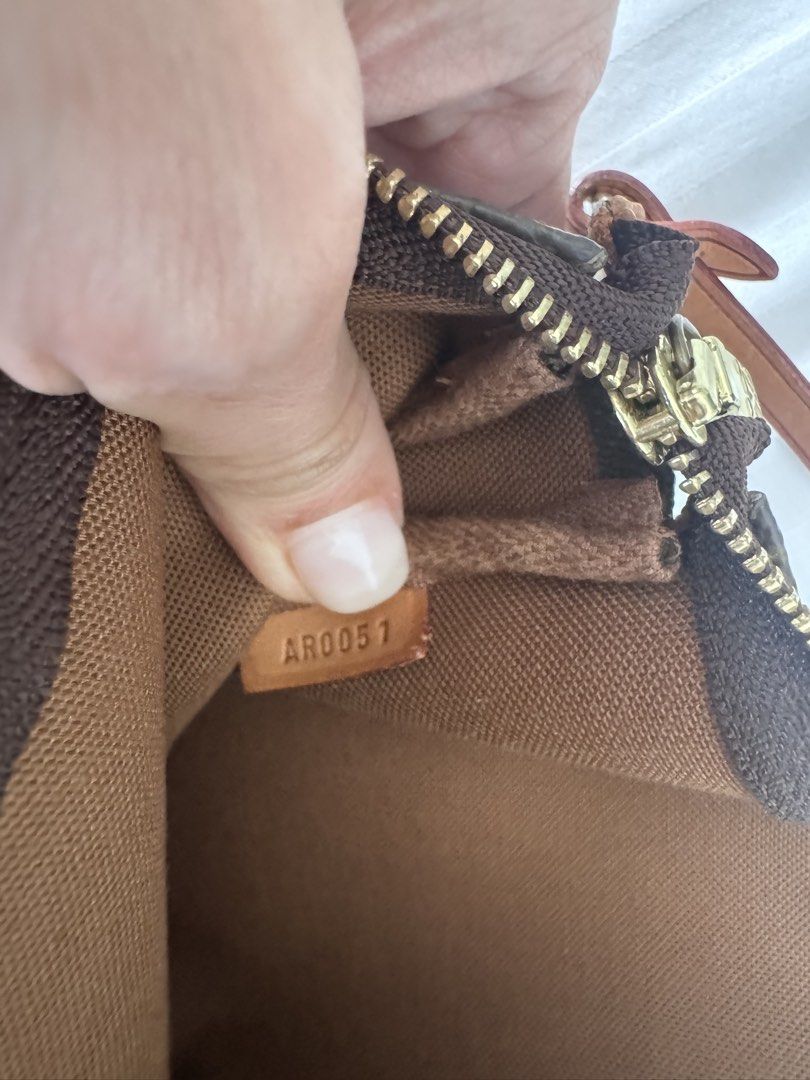 Louis Vuitton Monogram Graffiti Pochette Bag (Category: Luxury Bags & Wallets) located in Makati City. Submitted by curatedandnearlynew (Listing ID 1447762189, Image 3). Description: - Authentic Louis Vuitton Pochette Bag - Iconic Monogram Canvas with Graffiti Print Overlay (LV circa Marc Jacobs era) - Leather Strap and Gold-Tone Hardware - Clean Interior - Date Code: AR0051 - Comes with Dust Bag - Perfect for your essentials - Bought from vintag