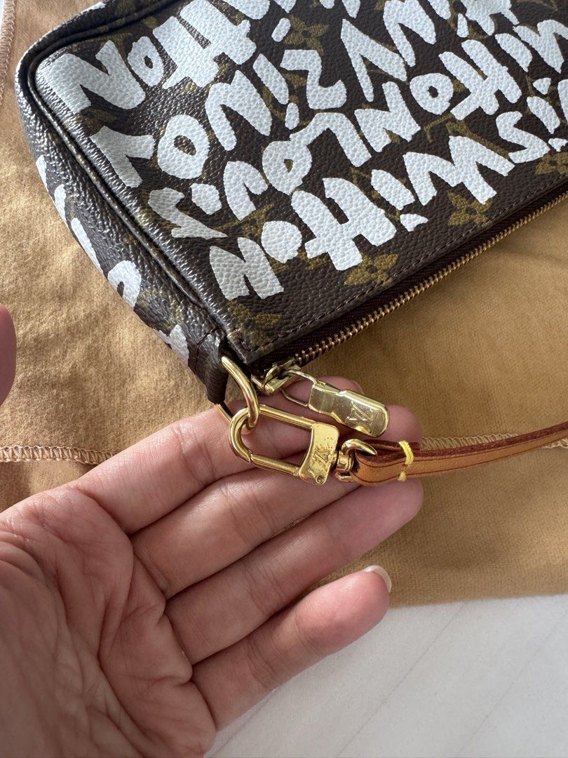 Louis Vuitton Monogram Graffiti Pochette Bag (Category: Luxury Bags & Wallets) located in Makati City. Submitted by curatedandnearlynew (Listing ID 1447762189, Image 2). Description: - Authentic Louis Vuitton Pochette Bag - Iconic Monogram Canvas with Graffiti Print Overlay (LV circa Marc Jacobs era) - Leather Strap and Gold-Tone Hardware - Clean Interior - Date Code: AR0051 - Comes with Dust Bag - Perfect for your essentials - Bought from vintag