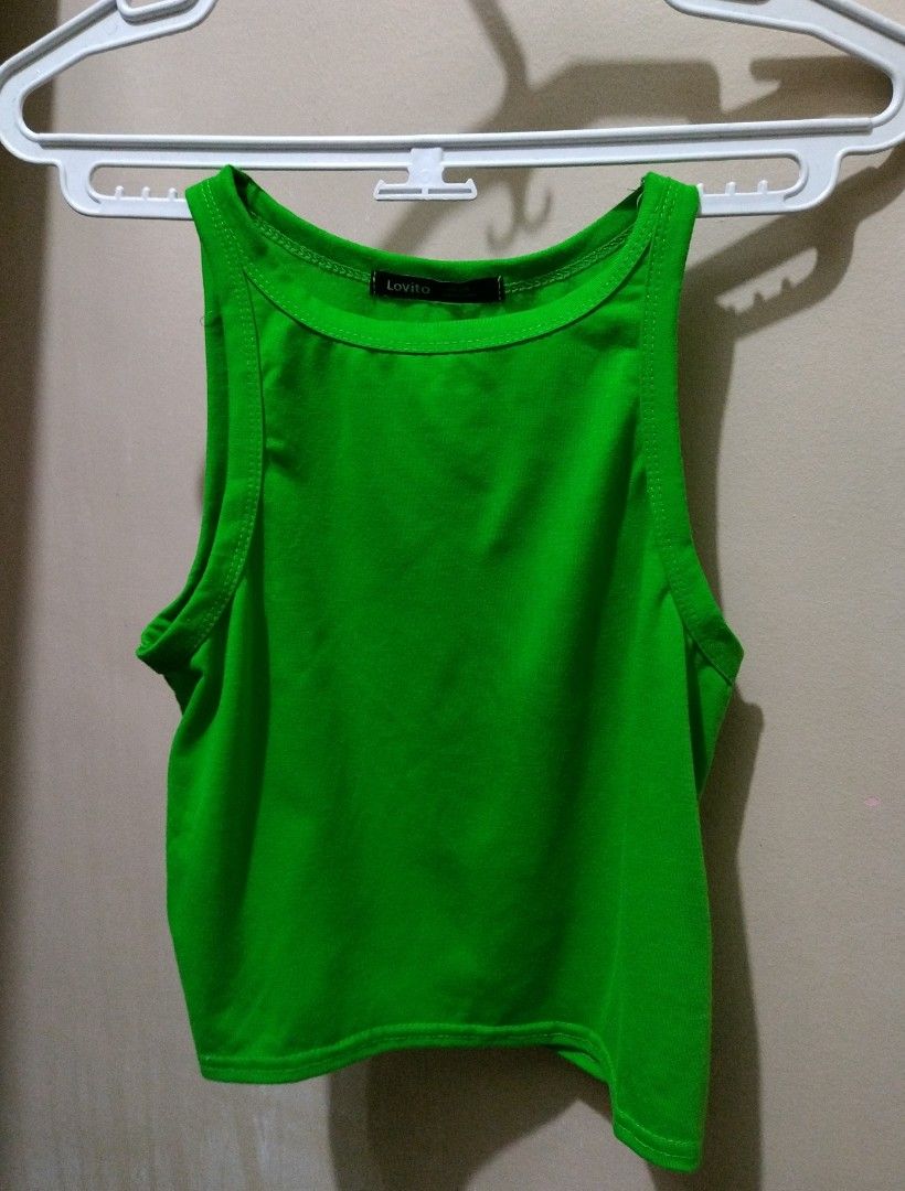 Lovito Green Tank Top (Category: Sleeveless) located in Makati City. Submitted by randomthingsiloved (Listing ID 1447877410, Image 1). Description: Used once! rfs: decluttering 📍 Manila - Brand: Lovito - Color: Bright Neon Green - Size: One Size (Best fits xs to s) - Style: Tank Top - Features: Simple, comfortable, easy to style Please read before buying ‼️ - Payment first (gcash) - Shipping handled by buyer - dm for ww.