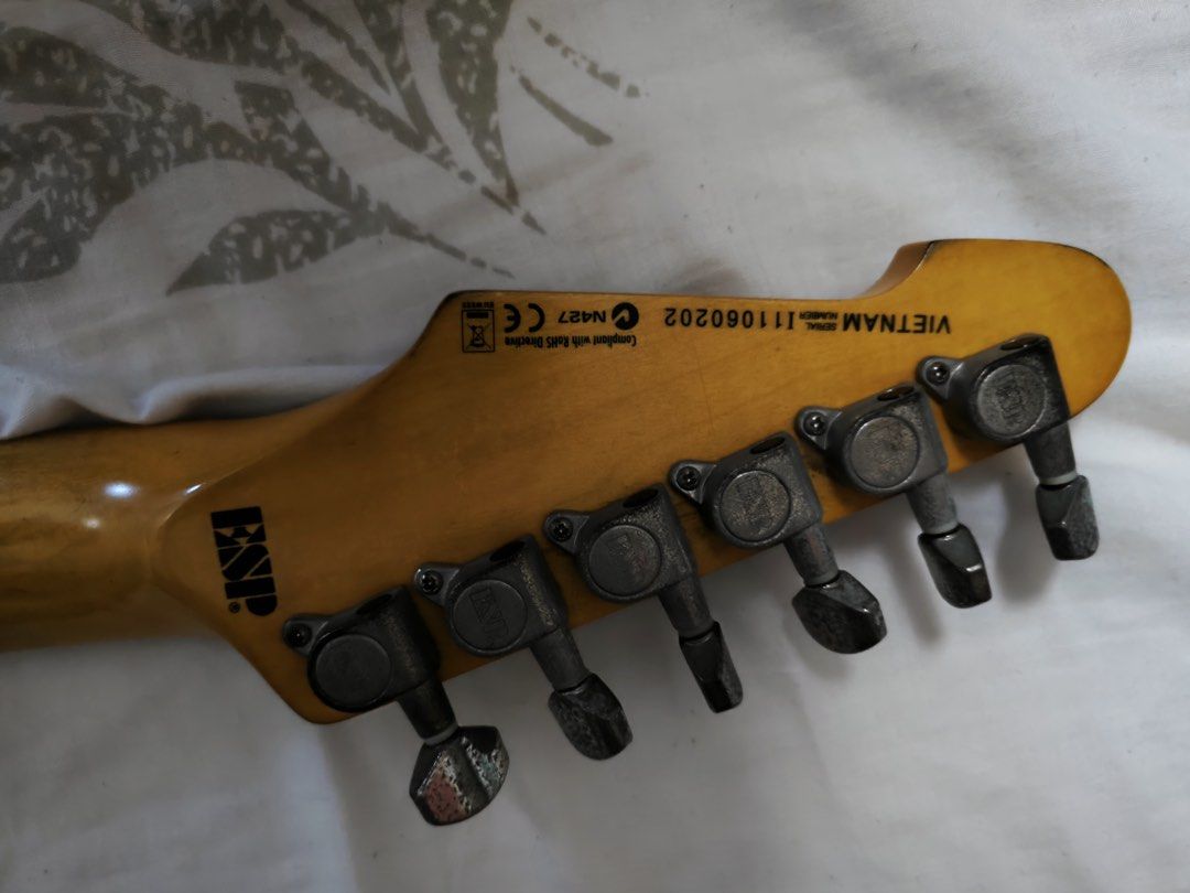 LTD ST-203 electric guitar (Category: Musical Instruments) located in Manila. Submitted by reian0323 (Listing ID 1447734370, Image 3). Description: - ESP LTD Electric Guitar ST-203 Black with white pickguard, relic design - Strat-style body with 3 single-coil pickups (replaced with Wilkinsons) - Maple neck with rosewood fretboard Quick spec details: https://reverb.com/p/esp-ltd-st-203.