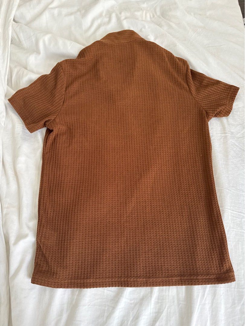 Manfinity Brown Waffle Knit Long Sleeve Top Size M (Category: Tshirts & Polo Shirts ) located in Quezon City. Submitted by enchongsarchives (Listing ID 1447737641, Image 2). Description: - Brand: Manfinity - Color: Brown - Style: Waffle knit top - Neckline: Crew neck - Sleeves: Long sleeves - Size: Medium (M) - Features: Textured fabric, versatile for layering or standalone wear - Styling: Easily pairs with jeans or skirts.