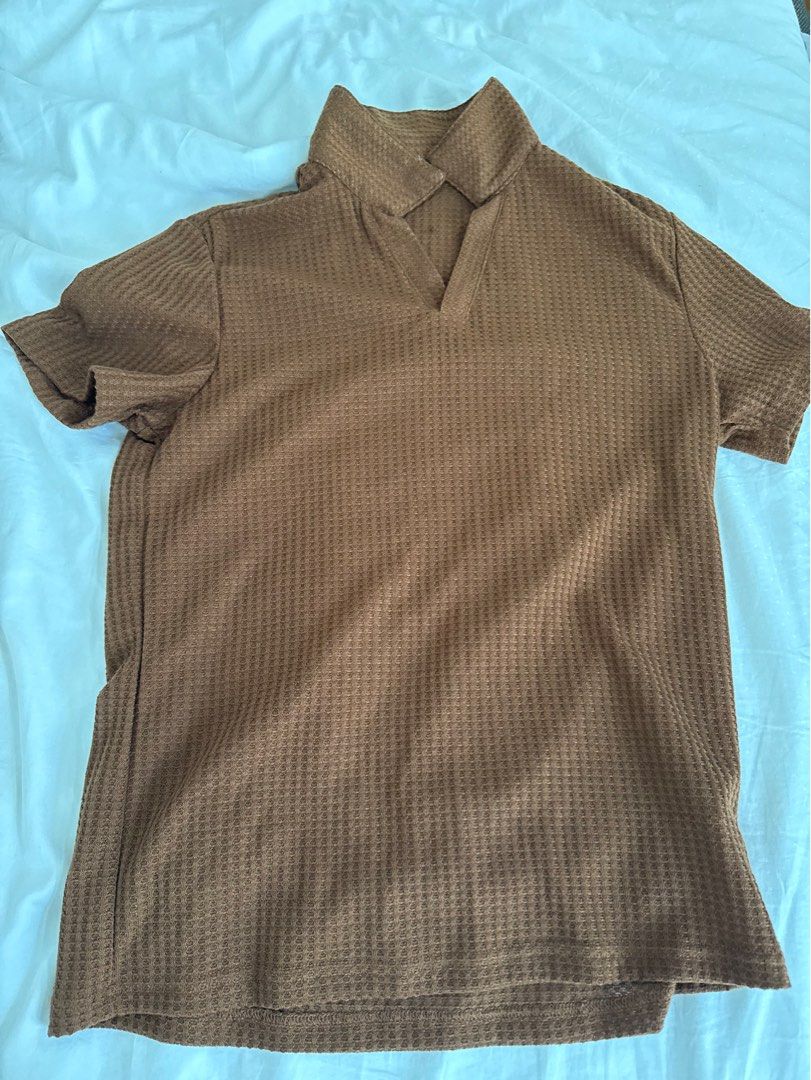 Manfinity Brown Waffle Knit Long Sleeve Top Size M (Category: Tshirts & Polo Shirts ) located in Quezon City. Submitted by enchongsarchives (Listing ID 1447737641, Image 1). Description: - Brand: Manfinity - Color: Brown - Style: Waffle knit top - Neckline: Crew neck - Sleeves: Long sleeves - Size: Medium (M) - Features: Textured fabric, versatile for layering or standalone wear - Styling: Easily pairs with jeans or skirts.