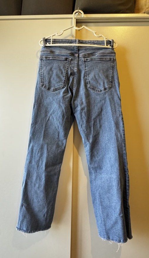 Mango Jeans Straight Leg Blue Denim Raw Hem (Category: Jeans) located in Pasig City. Submitted by pat.closetcleanup (Listing ID 1447702240, Image 2). Description: - MNG blue denim jeans - Straight leg cut - Raw hem with a slight flare at the bottom - Button and zip front closure - Two back pockets - Versatile for casual outfits.
