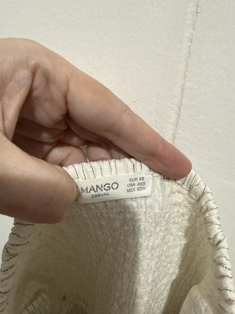 Mango Striped Cropped Jumpsuit XS (Category: Jumpsuits) located in Quezon City. Submitted by ktfsp (Listing ID 1447811400, Image 2). Description: - Mango white & black striped cropped jumpsuit - Square neckline with ruffled trim - Adjustable spaghetti straps - Wide leg culotte style - Made from a comfortable linen blend fabric - Ideal for casual outings and everyday wear.