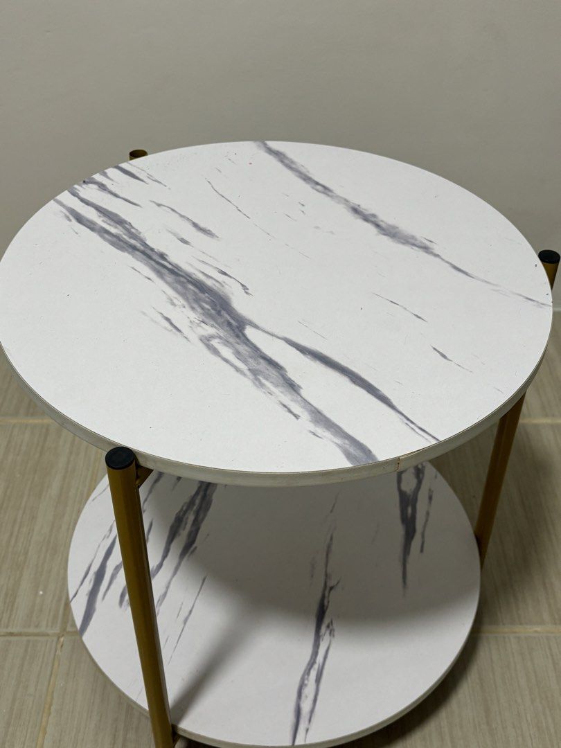 Marble Effect Round 2-Tier Side Table with Gold Legs (Category: Tables & Sets) located in Manila. Submitted by thingsforsale07 (Listing ID 1447715596, Image 1). Description: - Two-tier round side table - White top with elegant grey marble effect - Chic gold metal legs - Ideal for living room or bedroom - Compact design, fits any space - Simple assembly required.