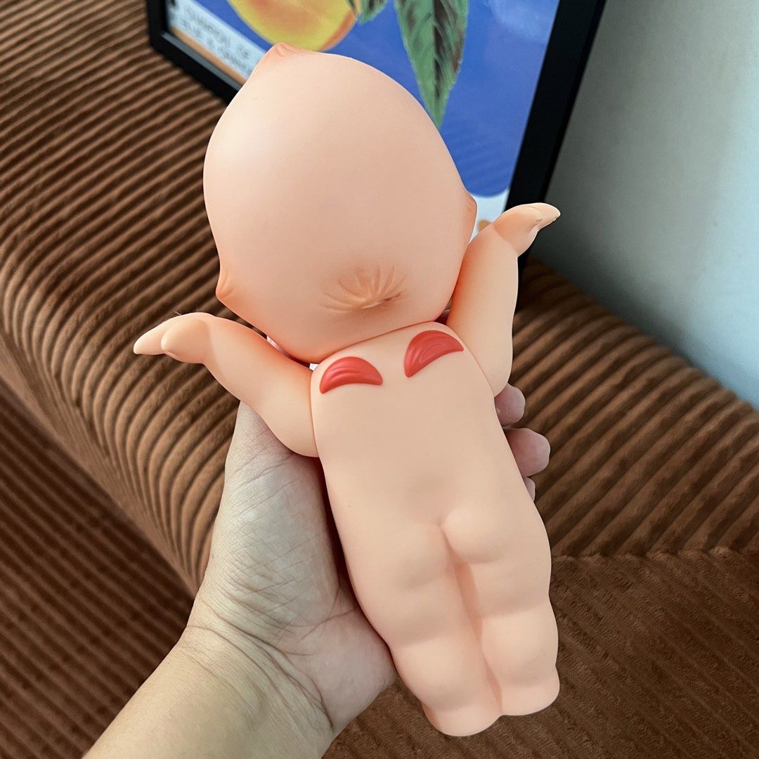 Medium Kewpie Doll with Freebies (Category: Toys & Games) located in Kajang. Submitted by aizaprelovedgoods (Listing ID 1447800975, Image 3). Description: Medium Kewpie Doll with Freebies - Good Condition (preloved clean) - Medium classic Kewpie doll - Iconic big eyes and rosy cheeks - Includes a sealed bag freebies item - Ideal for collectors or quirky home decor - Pm if interested only - Self pick up kajang or pos add rm8 Tq!✨.