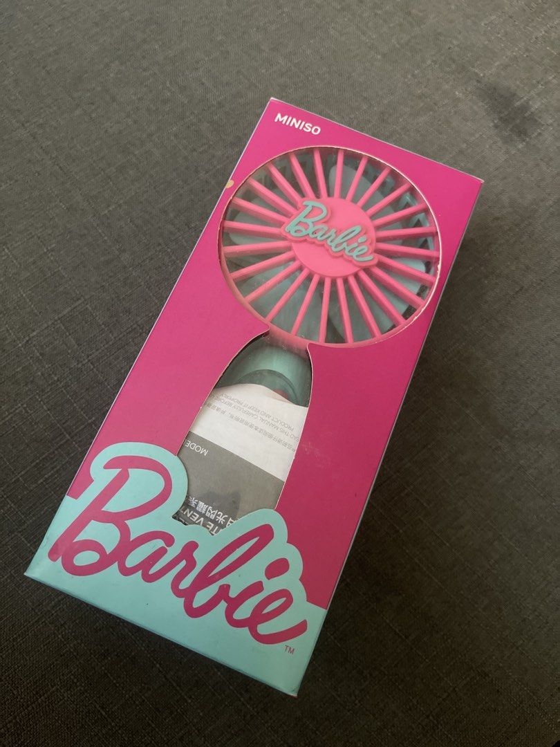 MINISO Barbie Pink Handheld Fan (Category: Fans) located in Manila. Submitted by helllodollie (Listing ID 1447757981, Image 1). Description: - Cute pink Barbie fan from MINISO - Features the iconic Barbie logo - Great for staying cool on the go - Compact and portable design - Perfect for any Barbie fan!.