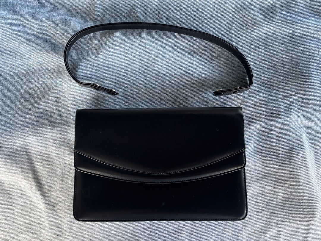 Montowa Handmade (Category: Shoulder Bags) located in San Juan City. Submitted by prelaabthings (Listing ID 1447720318, Image 2). Description: Montowa Handmade Black Leather Bag In a very great condition, minimal scratches at handle. Good for formal events like wedding a very nice piece. Removable handle strap to convert as clutch bag..