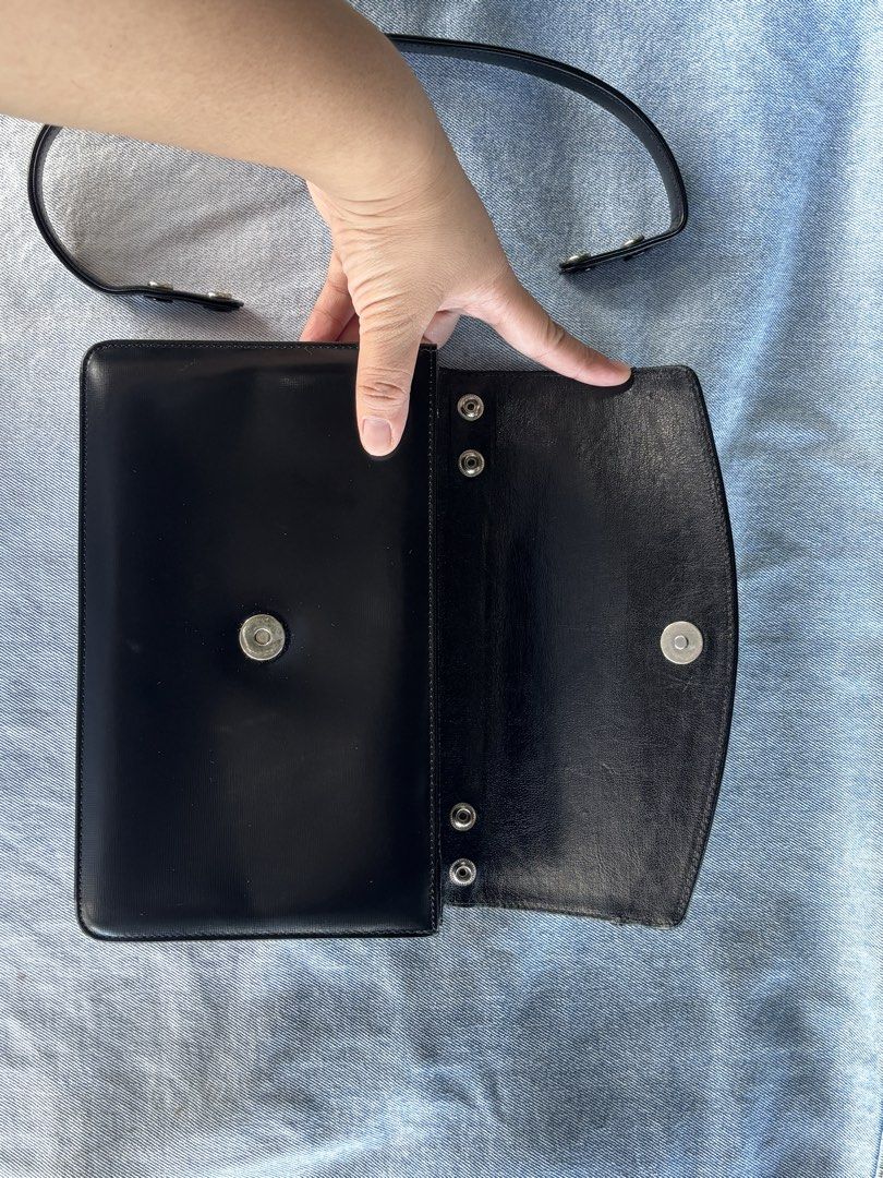 Montowa Handmade (Category: Shoulder Bags) located in San Juan City. Submitted by prelaabthings (Listing ID 1447720318, Image 3). Description: Montowa Handmade Black Leather Bag In a very great condition, minimal scratches at handle. Good for formal events like wedding a very nice piece. Removable handle strap to convert as clutch bag..