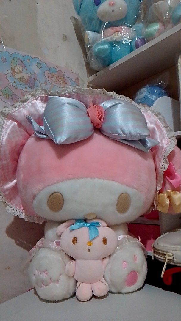 My melody (Category: Plushies & Soft Toys) located in Manila. Submitted by meloopsy (Listing ID 1447808626, Image 1). Description: - Adorable pink and white My Melody plush toy. - Features a large bow on My Melody. - Comes with a smaller pink bunny companion. - The bunny has a cute blue bow. - Ideal for any Sanrio enthusiast. - Great for decorating or snuggling..