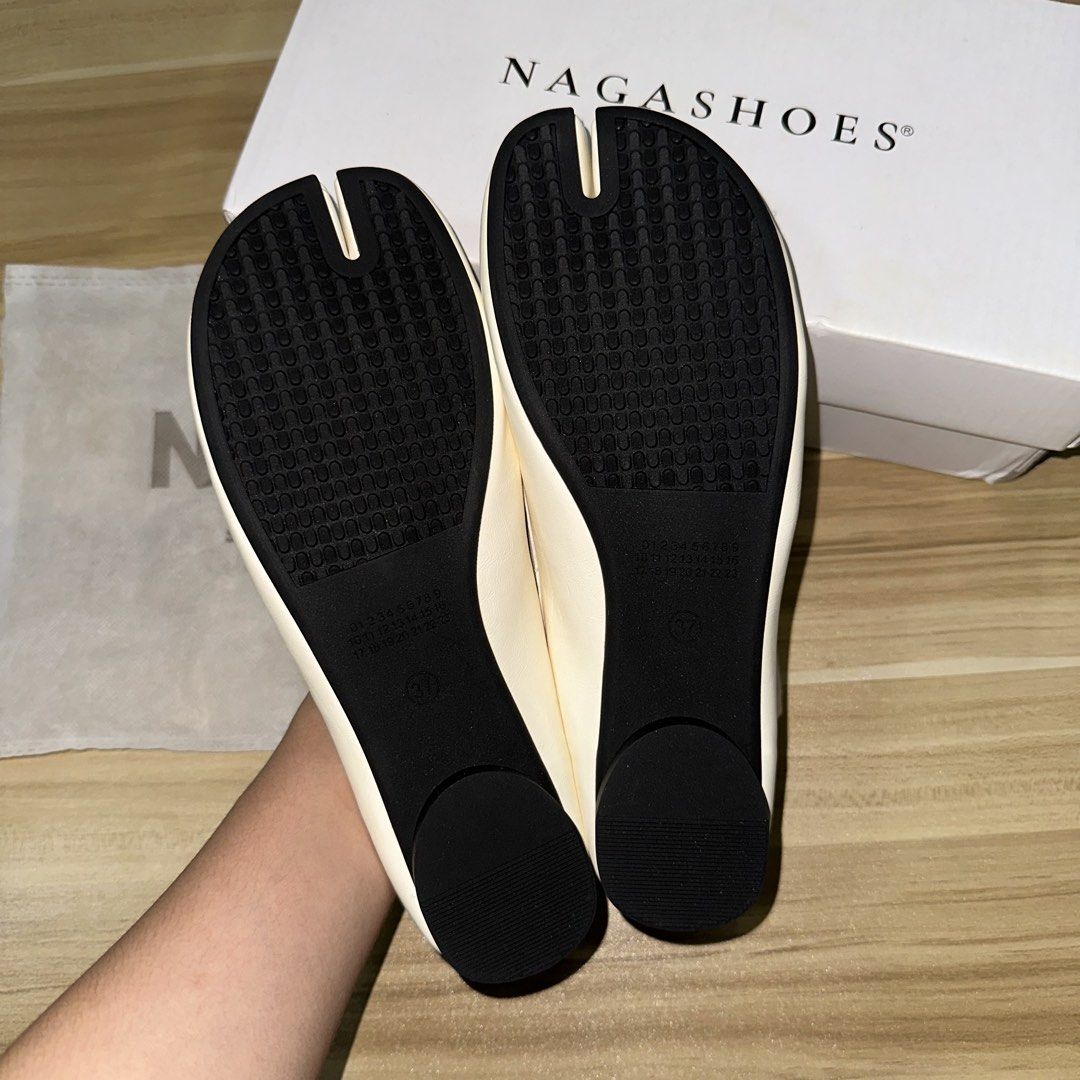 NagaShoes Tabi Split Toe Ballet Flats (Vietnam) (Category: Flats & Sandals) located in Mandaluyong City. Submitted by thekardiakart (Listing ID 1447795664, Image 3). Description: - Cream colored Tabi split toe ballet flats - Brand: NagaShoes from Vietnam - Size: 37 - Includes original box - Includes dust bag - RFS: Wrong size (NEVER worn, brand new) - Source: Bought via Pasabuy from @jayemcloset - Price: ₱ 1,795 (Selling it for the exact same pri