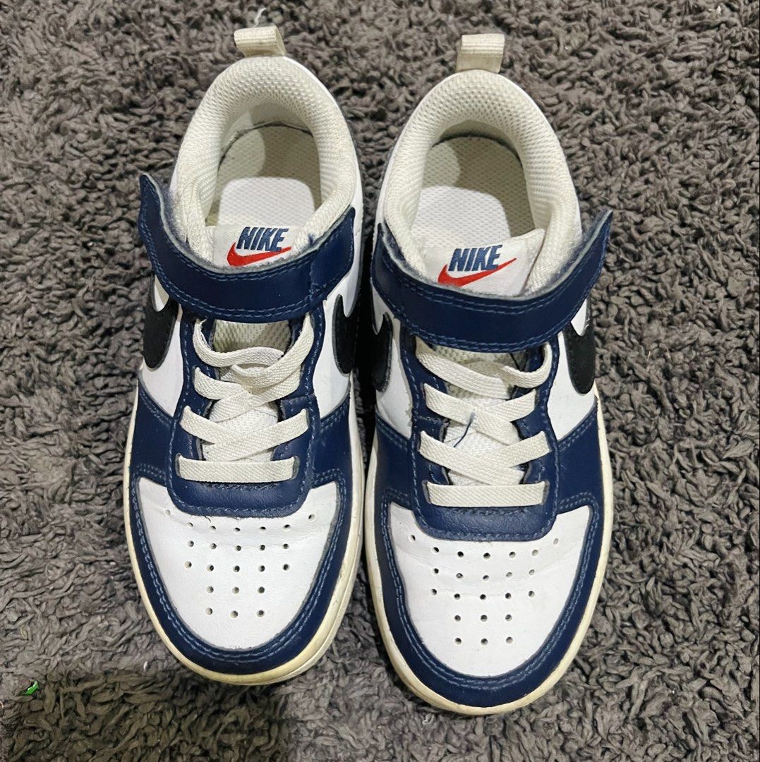 Nike Kids' Sneakers White Blue (Category: Babies & Kids Fashion) located in Lipa City. Submitted by jpam1995 (Listing ID 1447819995, Image 2). Description: - Nike kids' sneakers -EU28 - Color: White with navy blue accents - Ideal for: Everyday wear - konting punas., looks new na ulit.