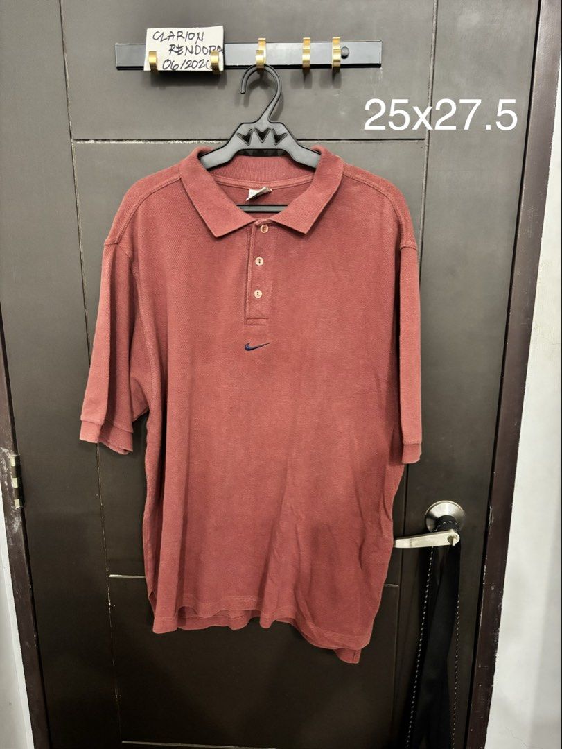 Nike Polo Shirt Men's Size M (Category: Tshirts & Polo Shirts ) located in Quezon City. Submitted by closetselects (Listing ID 1447736788, Image 3). Description: - Set of 2 Vintage Nike Polo Shirts - Size: Medium (M) - Origin: Made in Peru - Colors: Navy Blue and Reddish-Brown - Features: Classic Nike logo on chest - Ideal for: Casual wear, sporty look.
