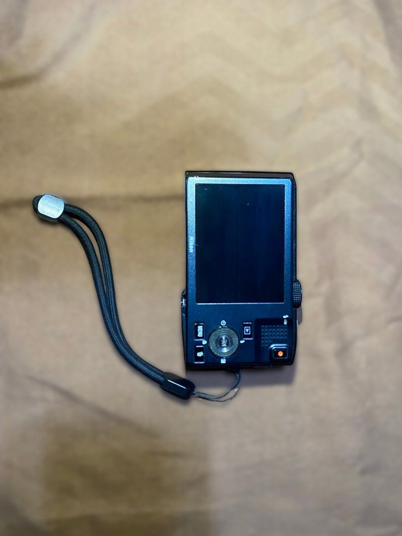 Nikon Coolpix S8000 10x Optical Zoom Digital Camera (Category: Cameras) located in Manila. Submitted by 87_solar (Listing ID 1447872818, Image 2). Description: - Black Nikon Coolpix S8000 camera - 10x wide optical zoom lens - 12.1 mp - Includes: Camera, Vivitar charger, 3 Nikon EN-EL12 batteries, USB cable - Ideal for everyday photos and travel - Ready to capture your memories inclusions: - 3 original batteries - card reader - charger.