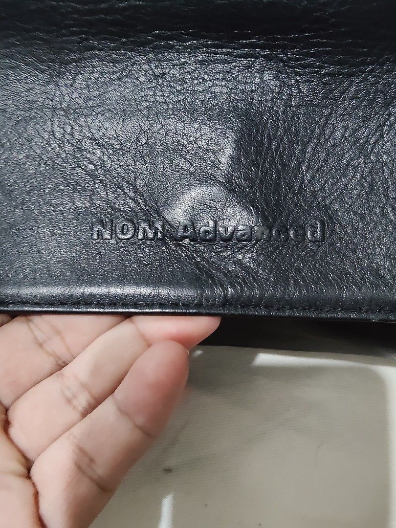 NOM ADVANCED Black Leather Top Handle Bag with Shoulder Strap (Category: Shoulder Bags) located in Cebu City. Submitted by almzcorner (Listing ID 1447706131, Image 3). Description: - Brand: NOM ADVANCED - Color: Black - Material: Genuine Leather with nice texture - Features: Top handles, detachable shoulder strap - Interior: Spacious with multiple compartments and a zippered pocket - Ideal for: Work or everyday use - Condition: Please check photo