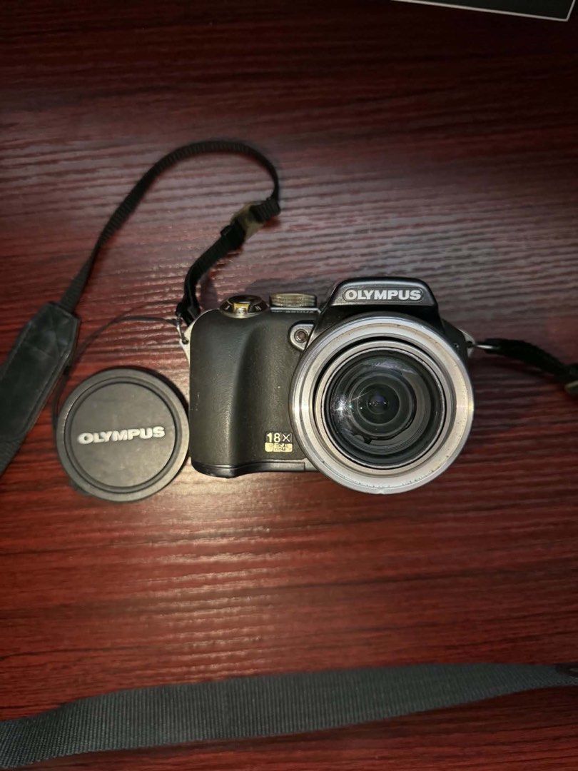 Olympus Sp-55ouz Digicam (NEGOTIABLE) (Category: Cameras) located in Manila. Submitted by digify.co (Listing ID 1447859558, Image 2). Description: Negotiable for sure buyer - Olympus digital camera - 18x optical zoom - 7.1 mp - Pop-up flash - Includes strap - Lens cap included - Screen has cracked (see last photo) OUTPUT NOT AFFECTED Inclusion - Strap - Battey - Unit - Battery Condition: very mild lcd burn, only visible in the dark (will send vid