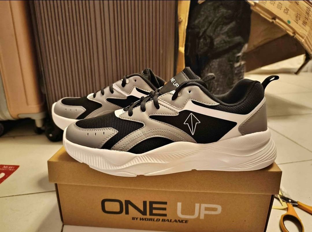 ONE UP by World Balance Sneakers (Category: Sneakers) located in Santo Tomas. Submitted by michael40593 (Listing ID 1447802791, Image 2). Description: One Up by World Balance Pluto Black-Grey Size Euro 42 / US 9 / 26.67 cm Brand New - Brand: ONE UP by World Balance - Color: Black and Grey - Style: Lace-up sneakers - Sole: Chunky white sole - Comfort: Comfortable for everyday wear - Condition: Comes with original box.