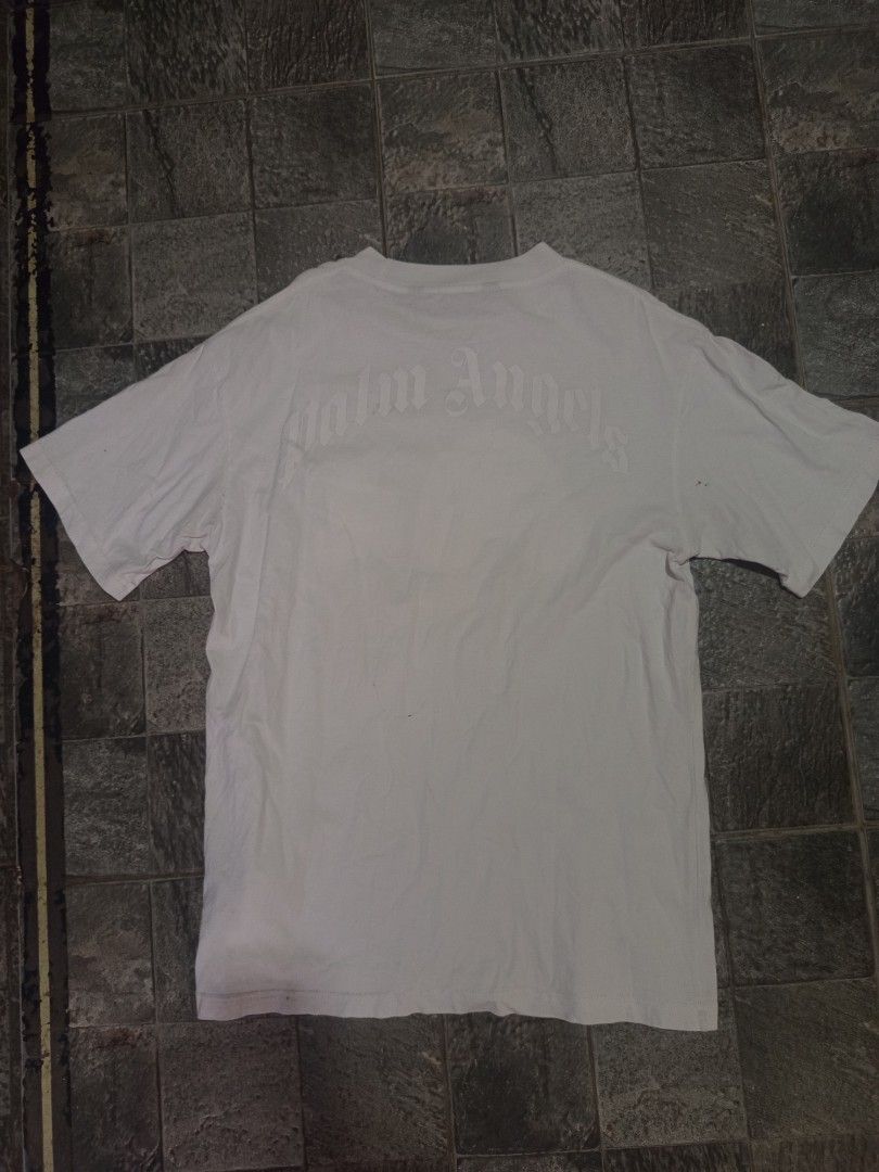 Palm Angels White Bear Print T-Shirt (Category: Tshirts & Polo Shirts ) located in Ligao. Submitted by john_thrift (Listing ID 1447720071, Image 2). Description: - Off only Palm Angels white t-shirt - Features iconic teddy bear graphic on the front - Palm Angels logo on the back - Essential for any streetwear collection 300 shipped.