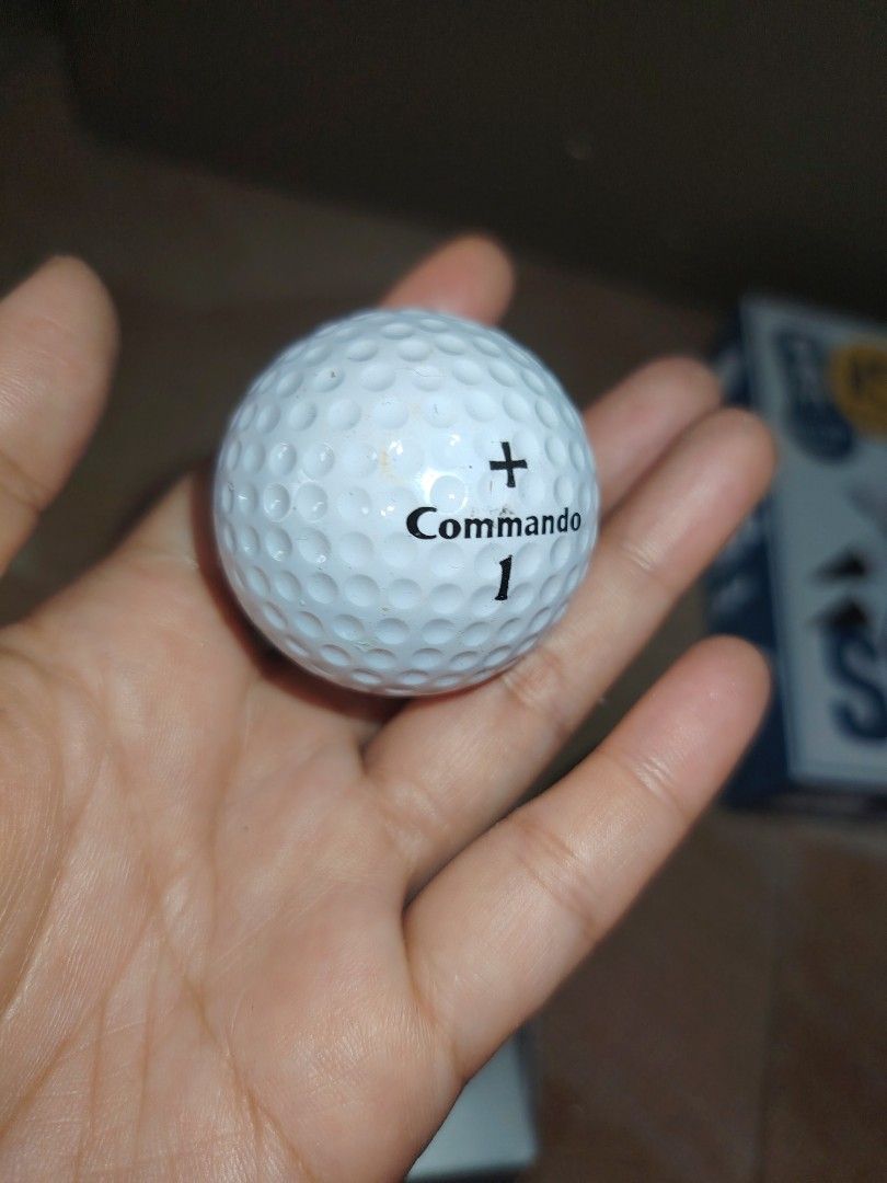 Penfold Commando Plus Golf Balls (12 Balls) (Category: Golf) located in Santiago. Submitted by aceheart0118672 (Listing ID 1447718130, Image 3). Description: - Box of 12 Penfold Commando Plus golf balls - High performance and enhanced durability - Modified dimple shape for extra distance - Visi-Glo white finish for visibility - Includes balls numbered 1, 2, and 3 - Ideal for your next round of golf.