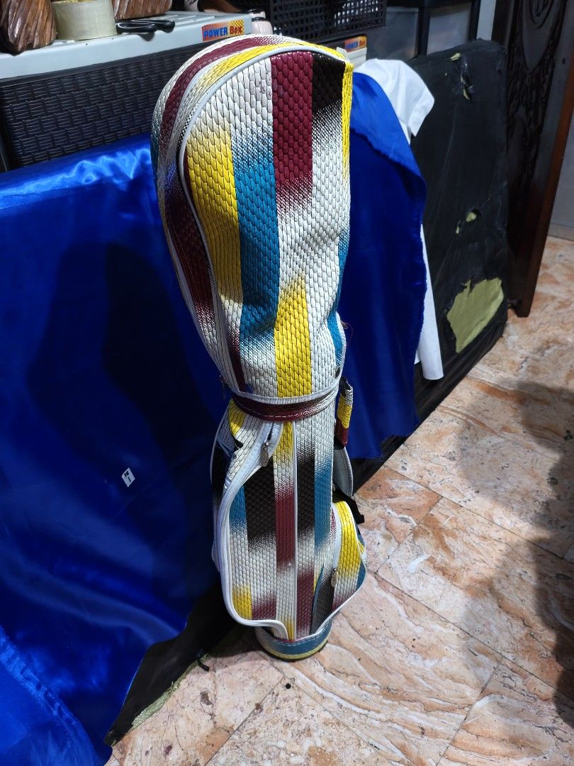 PGM Junior Golf Bag (Category: Golf) located in Manila. Submitted by meiyeon2 (Listing ID 1447882281, Image 2). Description: - Eye-catching PGM golf bag - Unique striped pattern: Red, Yellow, Blue, White - Standard size, spacious for clubs and accessories - Ideal for the golf course AsIs-pls see all pictures posted.