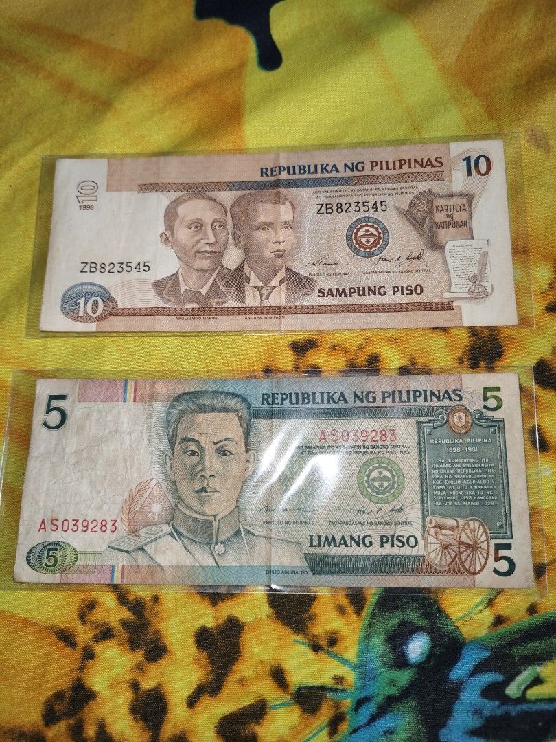 Philippine Peso Banknotes - 2, 5, 10 Piso Bills (Category: Currency) located in Antipolo. Submitted by rllenrapnap (Listing ID 1447728073, Image 3). Description: 450 set 4 pcs - Collection of older Philippine Peso banknotes - Includes 2 Piso, 5 Piso, and 10 Piso bills - Ideal for numismatists and history enthusiasts - All bills are kept in protective sleeves.
