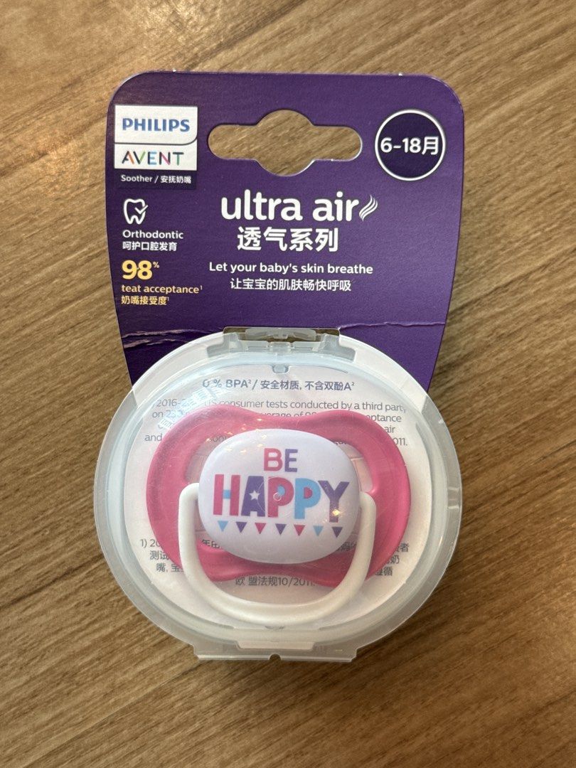 Philips Avent Ultra Air Pacifier 6-18 Months (Category: Soothers & Pacifiers) located in Makati City. Submitted by coral0805 (Listing ID 1447757085, Image 1). Description: - Philips Avent Ultra Air Pacifier - Suitable for babies 6-18 months - Orthodontic nipple for healthy oral development - 4 extra large air holes allow baby's skin to breathe - Comes with a convenient sterilizer case - Stylish pink color with 'BE HAPPY' design.