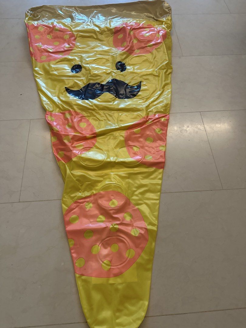 Pizza pool float (Category: Kids Toys) located in Singapore. Submitted by sim_r (Listing ID 1447791273, Image 1). Description: - Fun yellow inflatable toy - Features a cute cartoon face with a mustache - Adorned with pink polka dots all over - Ideal for parties or playtime - Easy to inflate and deflate - Kids will love it!.