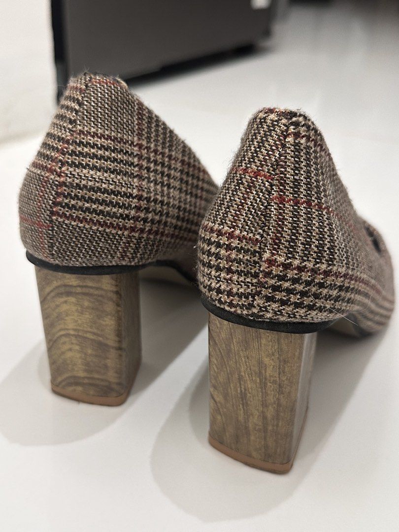 Plaid Pointed Toe Block Heels (Category: Heels) located in Quezon City. Submitted by erte_ph (Listing ID 1447692416, Image 3). Description: - Stylish gray, brown and red plaid heels - Elegant pointed toe design - Comfortable chunky 3 inches block heel with a wooden-look finish - Versatile: dress up or down - Comfortable for walking - Note: Minor ripped or tastas (see last photo) All parts are in good condition..